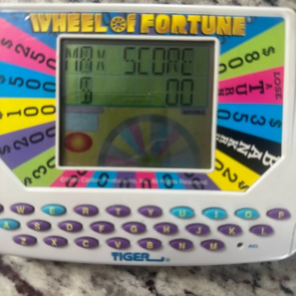 Tiger Wheel‎ of Fortune Handheld Game 1995 – Tested & Working with Sound
